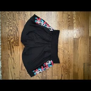 Coverup shorts with embroidery.